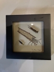 Wanduhr mit Fliegenmuster